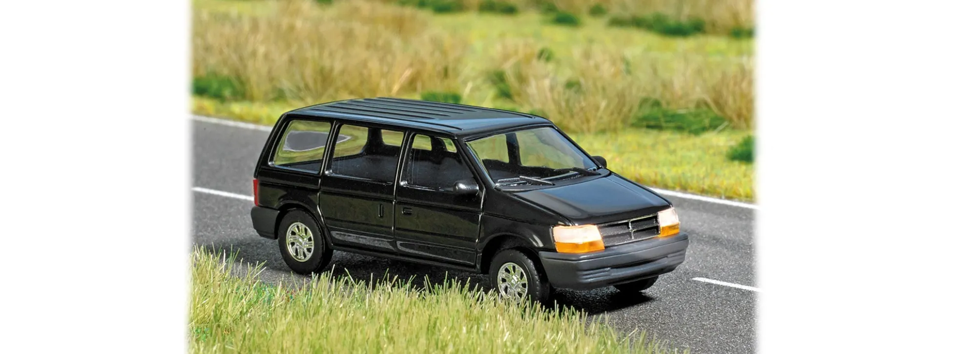 BUSCH 5657 Chrysler Voyager mit Beleuchtung Fertigmodell 1:87