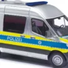 BUSCH 54059 Mercedes-Benz Sprinter Halbbus kurz Polizei München Blaulichtmodell 1:87